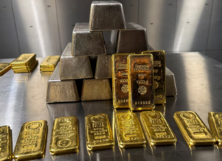 Wall Street cierra en máximos históricos; oro y plata rozan récords